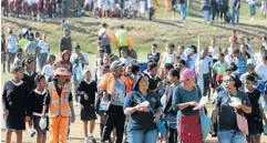  ??  ?? UNITED: The Helenvale community at the sports day march