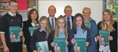  ??  ?? Pictured at the strategy launch with Tarbert Academy pupils are, left to right, Ann Marie Knowles, executive director of community services; Neil McKnight, head teacher at Tarbert; Councillor Rory Colville; and Anne Paterson, head of education.