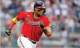  ?? Photograph: Alex Slitz/Getty Images ?? Atlanta’s Ronald Acuña Jr became the first player in major league history to hit at least 40 home runs and steal at least 70 bases in one season.