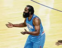  ?? Mark Mulligan / Staff photograph­er ?? James Harden wasn’t happy during Tuesday’s game or in remarks afterward but should be pleased that he landed in Brooklyn.