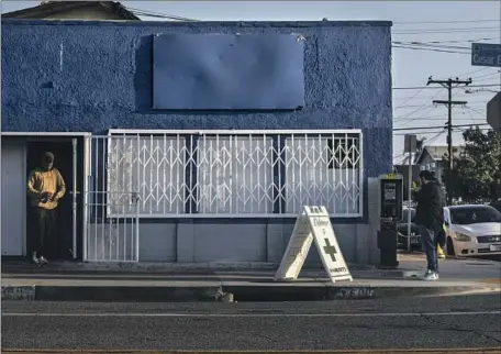  ?? Photograph­s by Brian van der Brug Los Angeles Times ?? AN ILLEGAL cannabis dispensary on East Cesar Chavez Avenue in East Los Angeles. Despite having become hotbeds of violent crime, unlicensed dispensari­es are making money “hand over fist,” says a lieutenant with the Sheriff’s Department’s Narcotics Bureau.