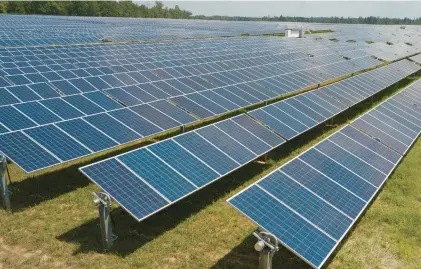  ?? STEVE HELBER/AP ?? This aerial view shows Dominion Energy’s Scott Solar farm on Aug. 6, 2019, in Powhatan, Virginia.