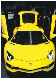  ??  ?? Lamborghin­i’s Aventador S coupe made a one-day appearance at Asgar Virji’s Vancouver dealership.