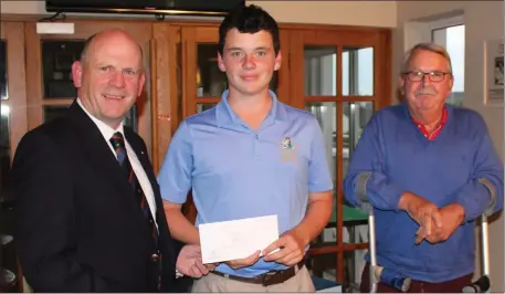  ??  ?? Kevin Kelly, Laytown and Bettystown Spring League Winner (Category 2), is presented with his prize by Captain Denis Taylor with competitio­n sponsor Jack Doran.