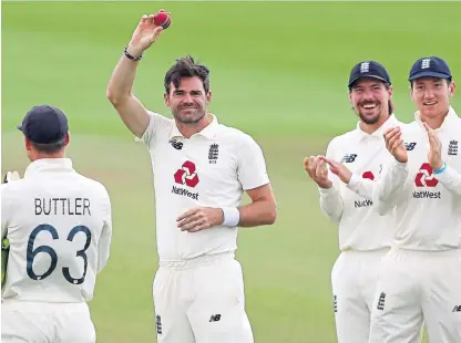  ?? Picture: PA. ?? James Anderson hails Azhar Ali’s wicket, his 600th, watched on by his team-mates.
