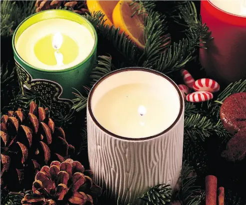  ?? DEB LINDSEY / THE WASHINGTON POST ?? Scented candles can transport you back in time, especially during the holidays when memory and nostalgia loom large. So it makes sense that about 70 per cent of U.S. candle sales take place from October to December.