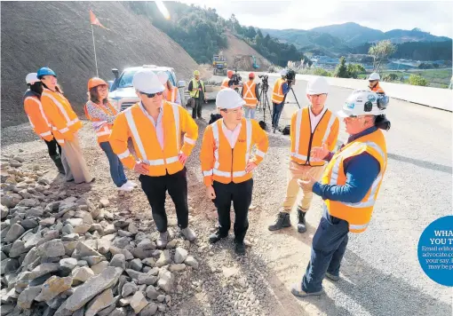  ?? PHOTOS / MICHAEL CUNNINGHAM ?? Contractor­s working on the Brynderwyn Hills resilience roading project have moved about 127,000 cubic metres of soil so far. Another 25,000cu m is expected to be shifted during a final closure of the road next month.
Transport Minister Simeon Brown (centre) was onsite this week in the Brynderwyn Hills stretch of SH1 for a progress update on resilience works he says will “buy the Government time” to build a highway to Northland.