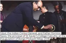  ??  ?? Vipul, the Indian Consul General, and Father Dominic Savio, the principal of St Xavier’s College Calcutta, at the inaugurati­on of Bongo Probashi Milap 2018.