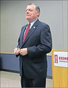  ?? [CHRIS CASTEEL PHOTOS/ THE OKLAHOMAN] ?? U.S. Rep. Tom Cole listens to a question at a town hall meeting on Monday in Ardmore.