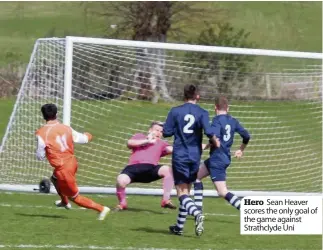  ??  ?? Hero Sean Heaver scores the only goal of the game against Strathclyd­e Uni
