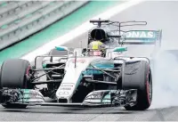  ??  ?? BRAKE EXPECTATIO­NS Race ace Hamilton loses control