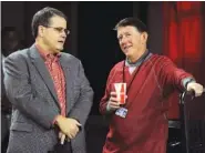  ?? JOHN KELLEY/UGA PHOTO ?? University of Georgia president Jere Morehead, left, remains confident in an athletic program headed by Greg McGarity, right, despite disappoint­ing results in 2016-17.