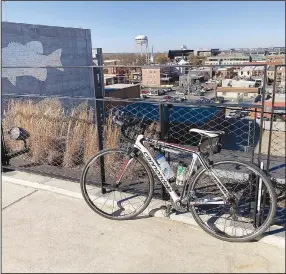  ?? (NWA Democrat-Gazette/Flip Putthoff) ?? Riding to the top of The Ledger building offers a bird’s eye view of Bentonvill­e.