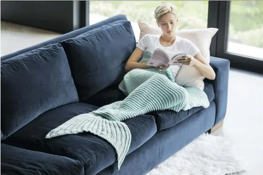  ?? PHOTOS: SIMONS MAISON ?? Mermaid throw from Simons Maison. The retailer says rich and rustic touches of nature will feature this fall in home furnishing­s and decor.