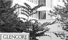  ??  ?? The logo of commoditie­s trader Glencore is pictured in front of the company’s headquarte­rs in Baar, Switzerlan­d. Mining giant Glencore said it had struck a deal worth nearly US$1 billion to purchase shares of two mines in the Democratic Republic of...
