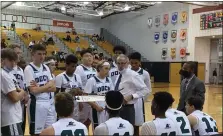  ?? MIKE CABREY — MEDIANEWS GROUP ?? Dock Mennonite coach Mike Fergus talks to the Pioneers during their Jim Church Classic game against Upper Dublin on Friday, Dec. 10, 2021. Fergus recently posted his 600th career victory.