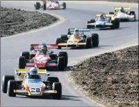  ??  ?? Carlos Reutemann leads Ronnie Peterson in ’72