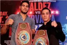  ??  ?? MEXICAN HEROES: Valdez [right] poses with countryman and fellow world champion Ramirez