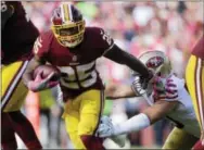  ?? MARK TENALLY — THE ASSOCIATED PRESS ?? Washington running back Chris Thompson (25) carries the ball during Sunday’s win over the 49ers.