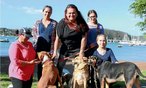  ??  ?? BOI Animal Rescue’s Josie Rogers, Nicki Cherringto­n, Summer Johnson, Jordan Cherringto­n, and Kaila Browne with rescued dogs, Chance, Aeshai and Maiden.