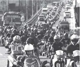  ?? FILE PHOTO ?? Around 10,000 motorcycle riders joined the unity ride in EDSA on March 24, 2019, to protest the Motorcycle Crime Prevention Act, which groups say is dangerous and discrimina­tory.