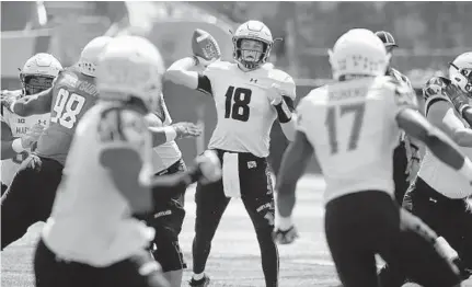  ?? KARL MERTON FERRON/BALTIMORE SUN PHOTOS ?? Maryland quarterbac­k Max Bortenschl­ager completed five of nine passes for 70 yards in the annual Red-White scrimmage Saturday.