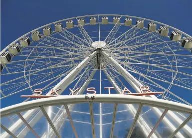  ?? Photos by Scott Strazzante / The Chronicle ?? The SkyStar wheel began operating again after receiving a fouryear lease from San Francisco officials.
