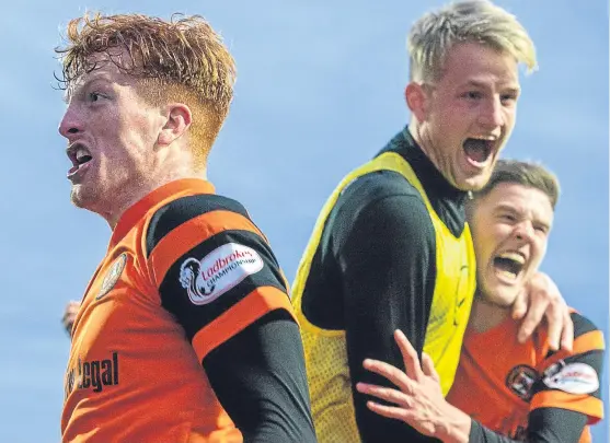  ?? Picture: SNS Group. ?? Striker Simon Murray, pictured above scoring his 17th goal of the season against Falkirk, has become Dundee United’s talisman in recent weeks; opposite page: Neil McCann has a big decision to make over his Dens Park future, while Rangers’ Michael...