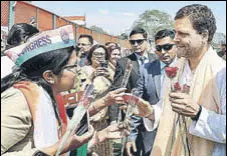  ?? PTI ?? Congress president Rahul Gandhi interacts with party workers during a rally in Dehradun on Saturday.
