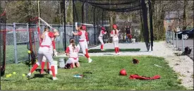  ?? David Jacobs/sdg Newspapers ?? The Shelby Lady Whippets take batting practice prior to Thursday’s game at the Whippets Athletic Complex.