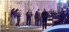  ?? | NVPNEWS ?? Police investigat­e in the 4500 block ofWestWash­ington early on Nov. 28 after police shot and killed Richard “Little Earl” Grimes after Grimes allegedly shot his pregnant girlfriend and a police officer.