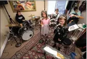  ?? JOEL ROSENBAUM — REPORTER FILE PHOTO ?? Members of the group Trash Panda rehearse “Viva la Vida” by Coldplay the fourth day of Live Music Center's Rock and Roll Camp in 2019.