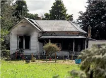  ?? PHOTO: SIMON O’CONNOR/STUFF ?? The fire that gutted this house is believed to have started in a dehumidifi­er.
