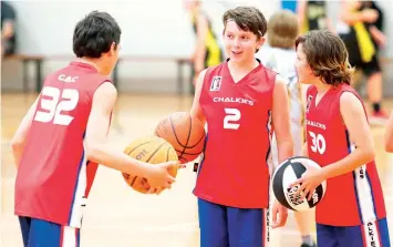  ?? ?? Plotting for their upcoming game are Chalkies players (from left) Austin Stirling, Jack Marsden and Ollie Bain. Photograph­s by MICHAEL ROBINSON.