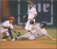  ?? NWA Democrat-Gazette/BEN GOFF • @NWABENGOFF ?? Auston Bousfield, San Antonio center fielder, slides in safe to steal second ahead of a throw to Northwest Arkansas shortstop Nicky Lopez in the seventh inning Monday during the game at Arvest Ballpark in Springdale.