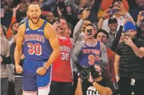  ?? MARY ALTAFFER/ASSOCIATED PRESS ?? Warriors guard Stephen Curry reacts after scoring a 3-point basket during Tuesday’s game against the Knicks at Madison Square Garden in New York. Curry hit his 2,974th 3-pointer in the first quarter, breaking the record set by Ray Allen.