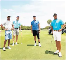  ?? MIKE EHRMANN/GETTY ?? (From left) Tiger Woods, Peyton Manning, Tom Brady and Phil Mickelson pose for a photo during a practice round for The Match: Champions For Charity at Medalist Golf Club.