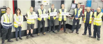  ??  ?? What More UK in Altham are investing in the future of employees and young adults. Pictured (L-R): Operations Manager, Gary Ireland; HR Director, Kelly Torson; employees James Howell, Alex Graham, William Moat, Izaak Holden and Matthew Ingham; Settings Manager, Lee Smith; and Tool Room Supervisor, Steven Kay