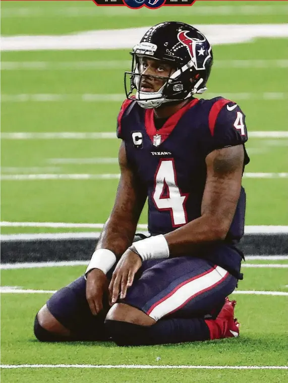  ?? Brett Coomer / Staff photograph­er ?? Texans quarterbac­k DeshaunWat­son, who was 28 of 39 for 365 yards and three touchdowns and an intercepti­on, kneels after failing to convert on third down.