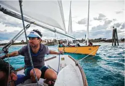  ??  ?? Porter Fox and friends sail from Little Farmer’s Cay to Big Farmer’s Cay in the Bahamas’ Exuma Islands.