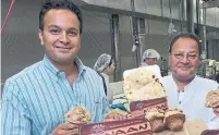  ?? LUCAS OLENIUK TORONTO STAR FILE PHOTO ?? Two of the founders of FGF, Ojus Ajmera, left, and father Sam are pictured in 2006. The firm began in 2004 and describes itself as one of the largest industrial bakeries on the continent.