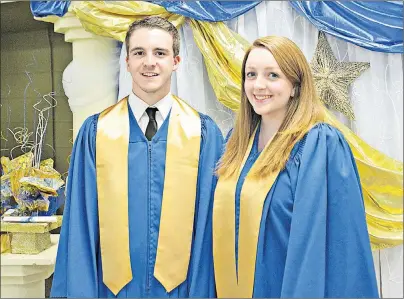  ?? DESIREE ANSTEY/JOURNAL PIONEER ?? Class valedictor­ian and winner of the Governor General’s Academic Medal for excellence, Julia Singer, right, and classmate Owen Gallant, were among the 30 students that crossed the finish line at École Evangeline.