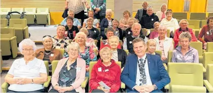  ?? ?? Residents aged over 60 paid a visit to MP Tim Costley (front, right) in Parliament last week.
