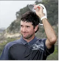  ?? AP/ERIC GAY ?? Bubba Watson tips his cap after winning the Dell Technologi­es Match Play on Sunday in Austin, Texas. Watson defeated Kevin Kisner 7 and 6 for his second World Golf Championsh­ip title.