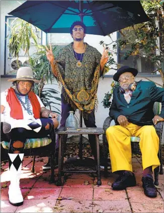  ?? Francine Orr Los Angeles Times ?? STEVE ELLISON, a.k.a. Flying Lotus, is f lanked by Stephen Bruner, a.k.a. Thundercat, and George Clinton, who collaborat­ed on a track on the 10th-anniversar­y collection “Brainfeede­r X.”