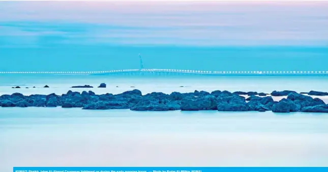  ??  ?? KUWAIT: Sheikh Jaber Al-Ahmad Causeway lightened up during the early morning hours. — Photo by Bader Al-Mithin (KUNA)