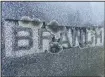  ?? (arkansas democrat-Gazette/ Celia Storey) ?? Lichen clings to the monument of Stephen Walker Branch and Lou Ida Branch, parents of ouida Bergere Rathbone.