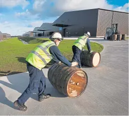  ??  ?? Whisky being laid down at Diageo’s £150 million Cluny Bond warehousin­g developmen­t in Fife.