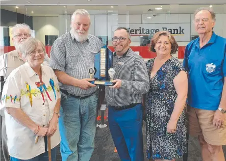  ?? Picture: Contribute­d ?? WINNERS: Receiving prizes for the first online Heritage Trophy are (from left) Bob Littlehale­s, Nancy Forrest, John Graham, Greg Lange (Heritage Bank), Cidinha Moss (club president), and Rod Forrest.