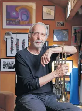  ?? Al Seib Los Angeles Times ?? HERB ALPERT relaxes with his horn in his home recording studio in Malibu.